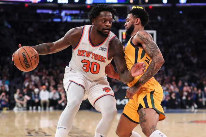 Knicks forward Julius Randle is defended by Utah Jazz guard Nickeil Alexander-Walker.
