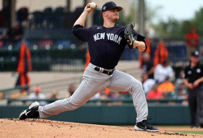 Yankees pitcher Clarke Schmidt throws a pitch.