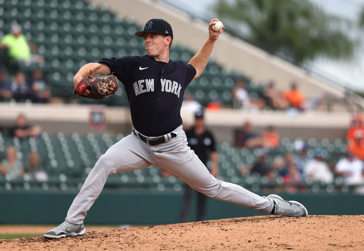 New York Yankees pitcher JP Sears throws a pitch during the fourth inning against the Tigers.