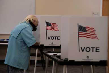 FILE PHOTO: Voters cast their ballot in New Mexico primary