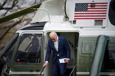 FILE PHOTO: U.S. President Joe Biden arrives aboard Marine One