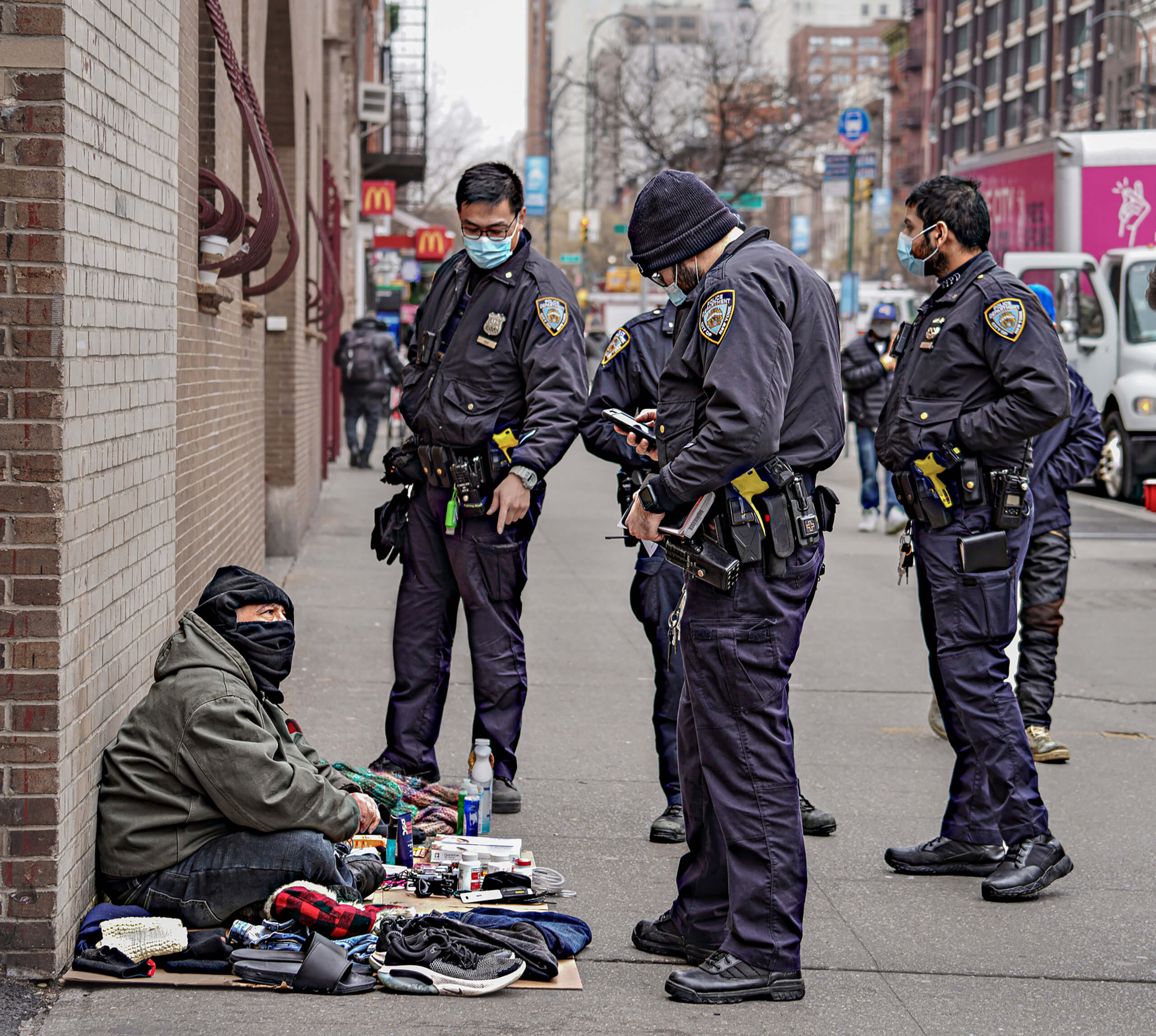 No longer a free market: NYPD cleans up illegal vendors on East 14th Street 6 A man receives a summons