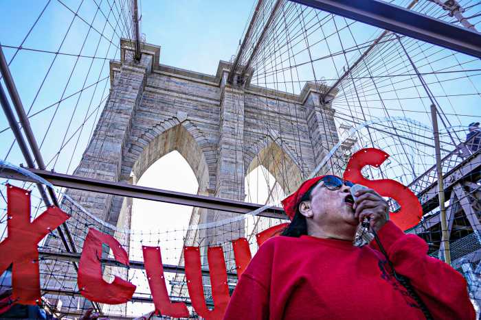 Bridging the gap: Excluded workers march over Brooklyn and Manhattan Bridges for more funding 5