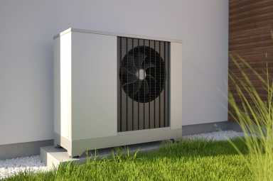 Air heat pumps beside house