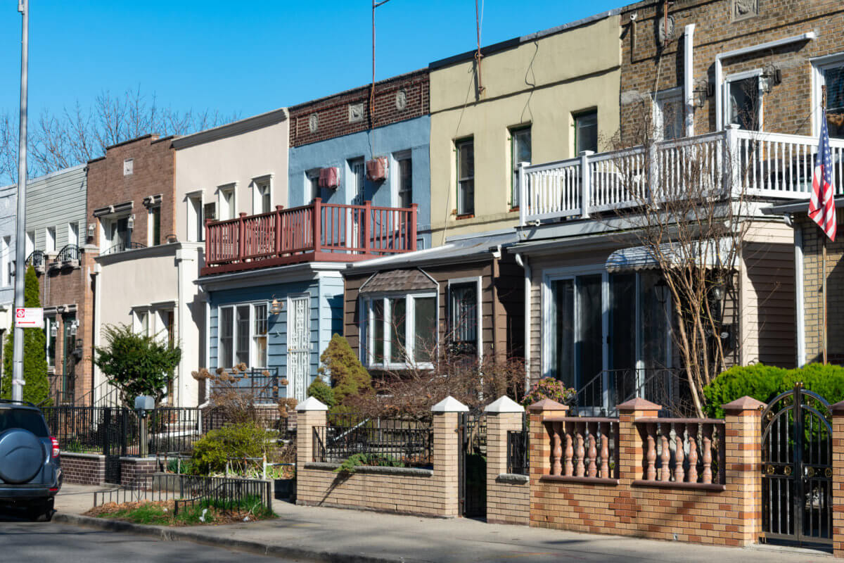A Row of Beautiful Old Homes along the Sidewalk in Astoria Queens New York