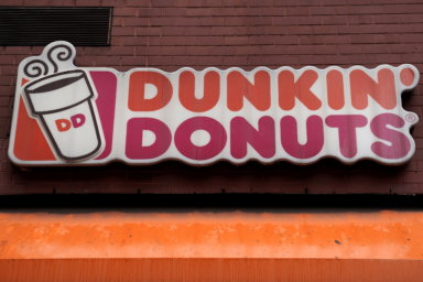 A Dunkin’ Donuts logo is pictured