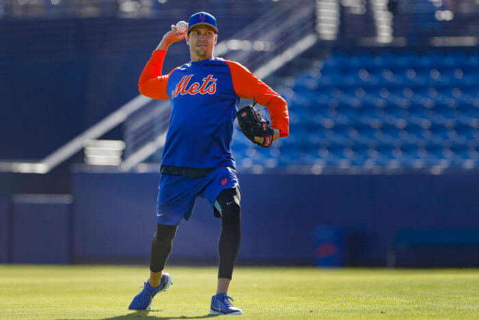 Mets pitcher Jacob deGrom works out during spring training.