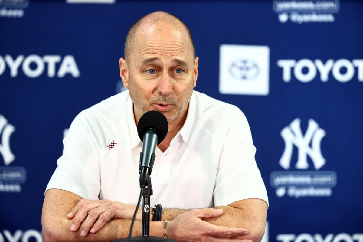 Yankees general manager Brian Cashman talks with the media.