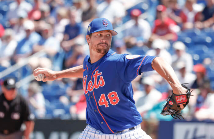 Mets pitcher Jacob deGrom throws a pitch during spring training.