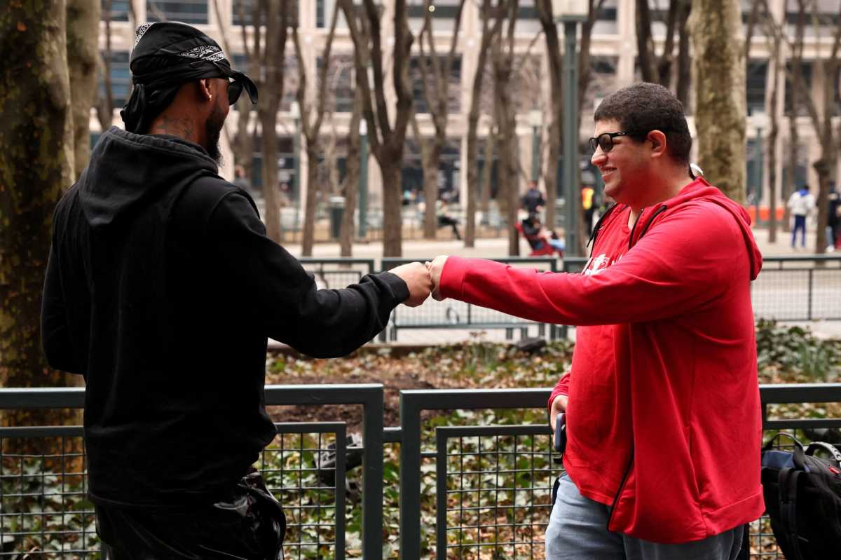 FILE PHOTO: Amazon workers arrive to observe the vote count to unionize at the NLRB office in Brooklyn, New York City