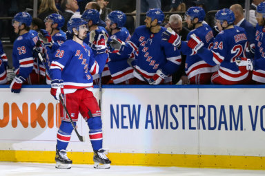 Rangers left wing Chris Kreider celebrates with teammates after scoring a goal against Ottawa Senators.