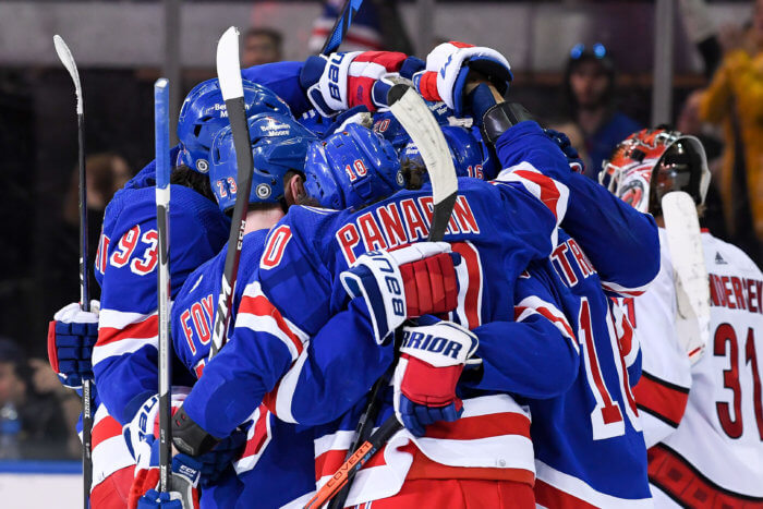 Rangers players celebrate the 50th goal of the season by left wing Chris Kreider.