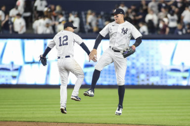 Yankees right fielder Aaron Judge and second baseman Isiah Kiner-Falefa celebrate after defeating the Toronto Blue Jays 4-0.