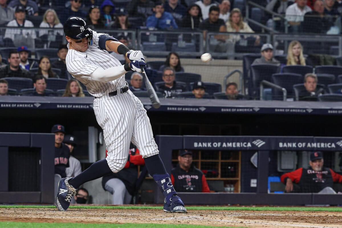 Yankees right fielder Aaron Judge hits a solo home run during the fifth inning against the Cleveland Guardians.