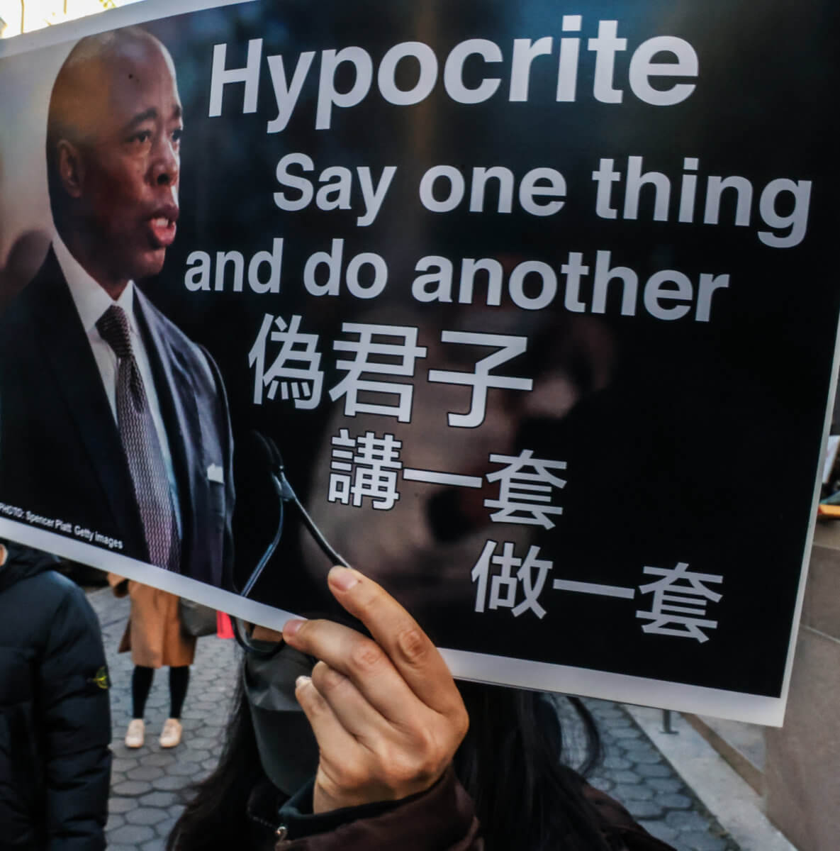 Fenced up: Protesters rally in Chinatown as new jail construction prepares to begin 7