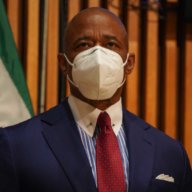 Mayor Eric Adams wearing a COVID-19 mask