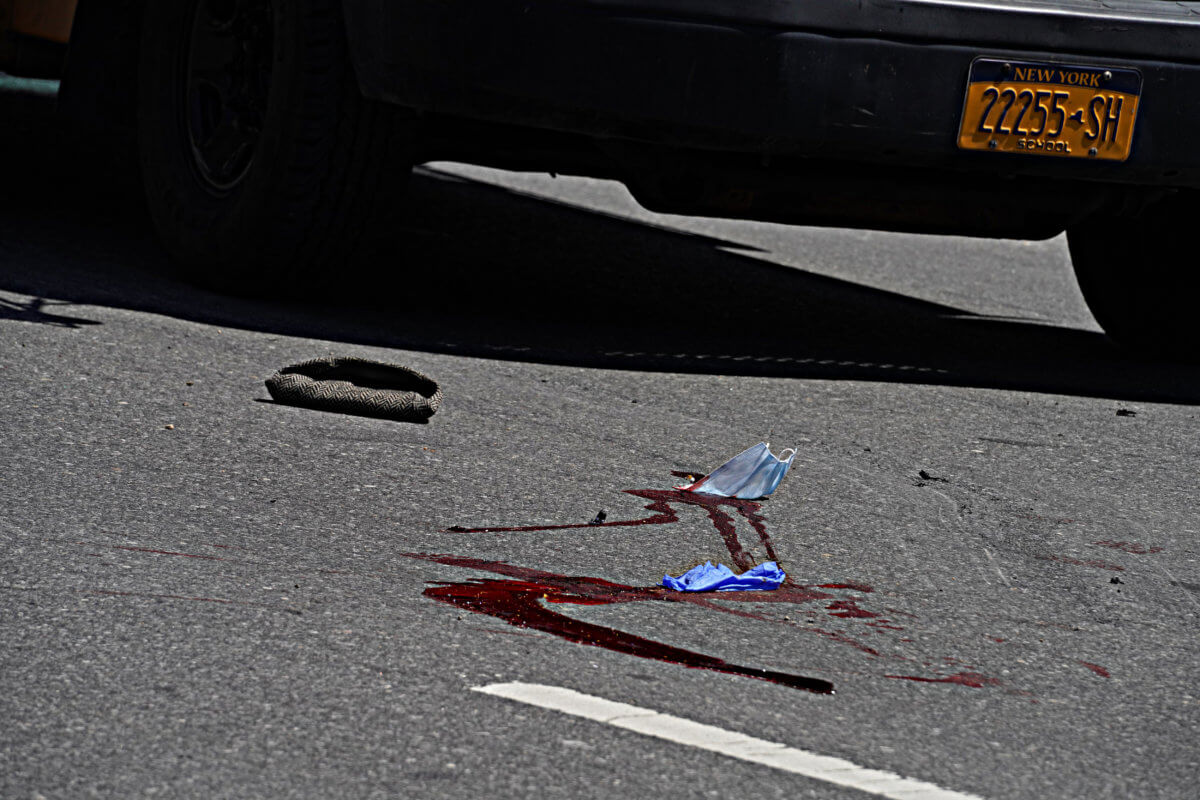 Elderly man in critical condition after being trapped under school bus in Tudor City 2