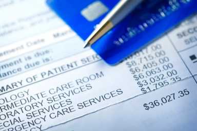 GettyImages-1049802688_hospital-bill_1350-1200×800-1