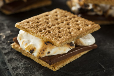 S’more with burnt marshmallow and melted chocolate
