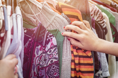 looking on a flea market for clothes