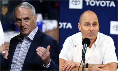 MLB commissioner Rob Manfred (left) sent a letter to Yankees general manager Brian Cashman detailing alleged improper acts by the Yankees.