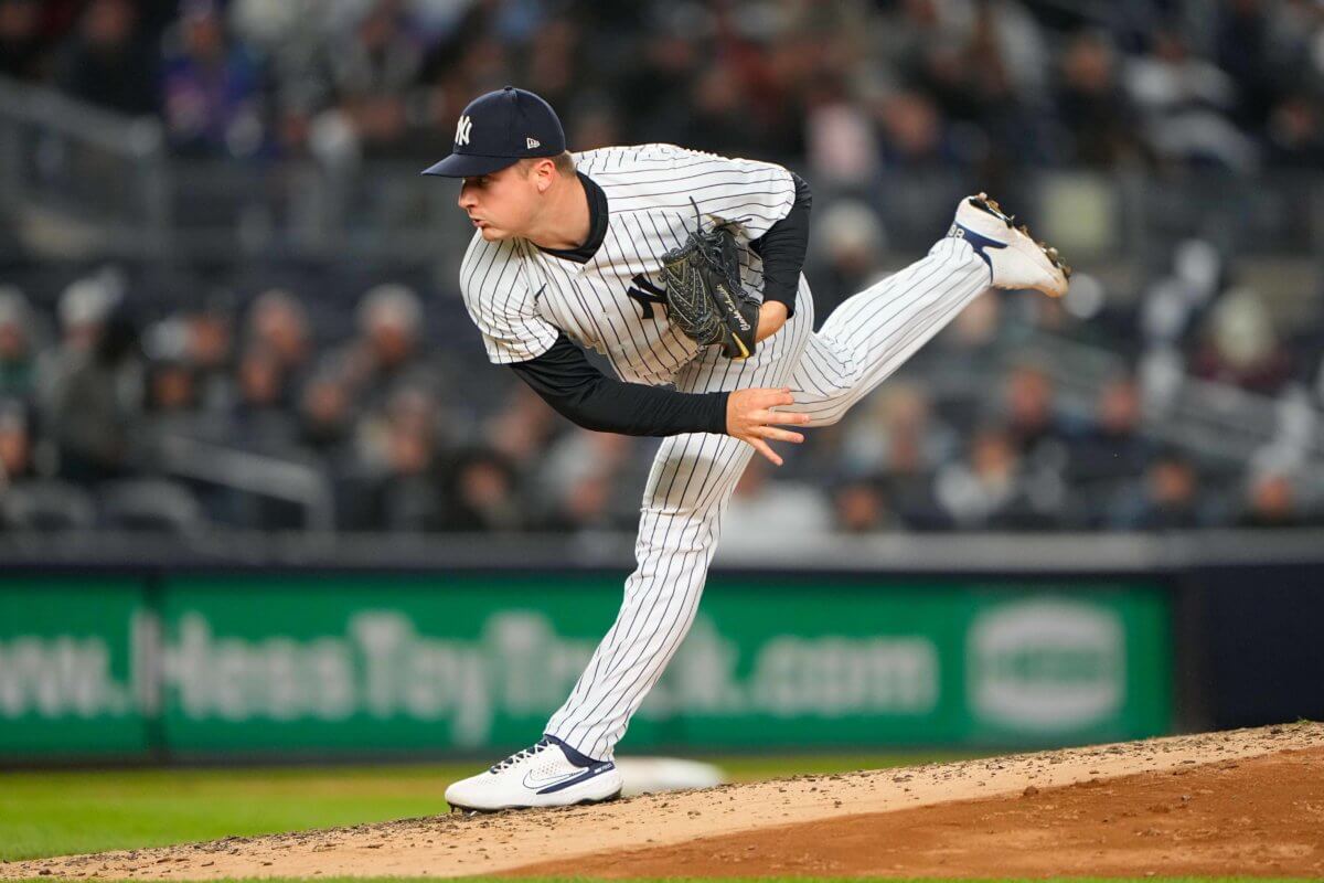 Yankees pitcher Clarke Schmidt delivers a pitch.