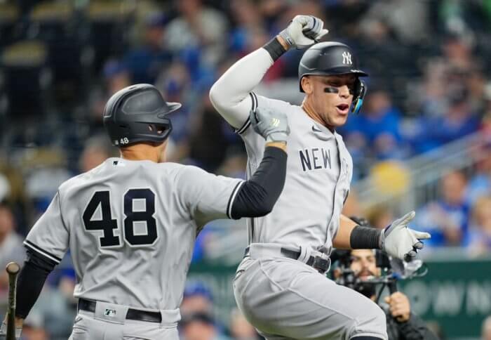 Yankees' Aaron Judge celebrates with Anthony Rizzo after hitting a home run against the Kansas City Royals.