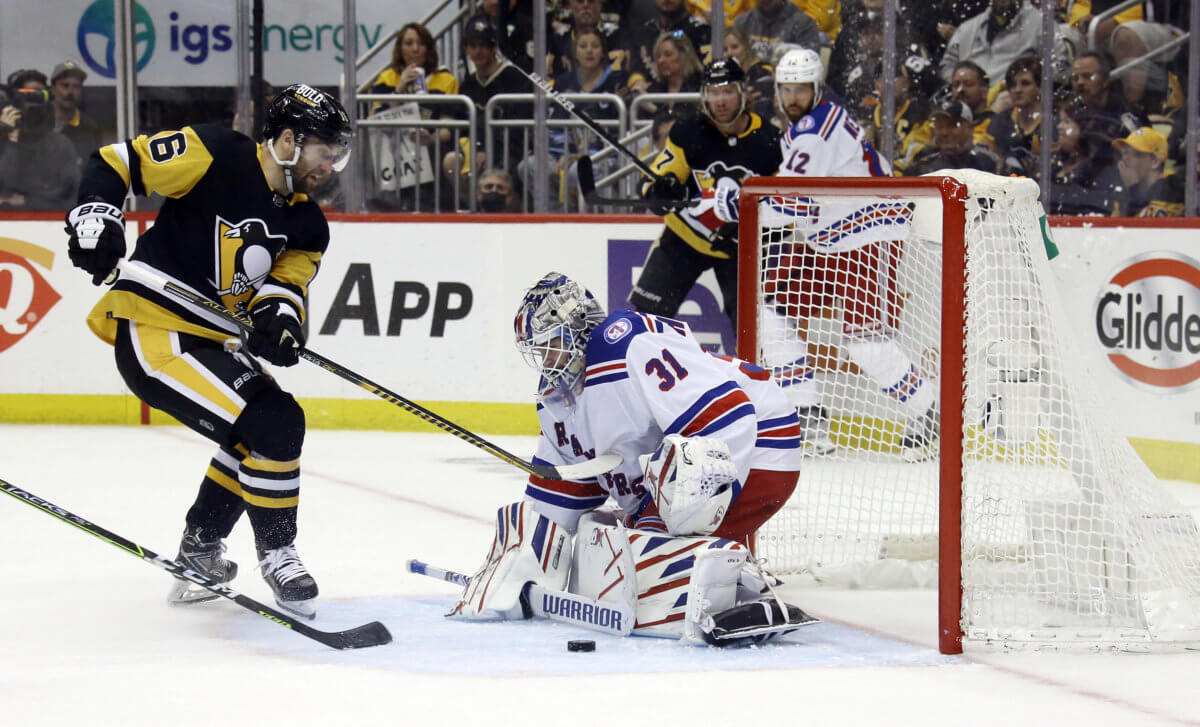Penguins left wing Jason Zucker shoots against Rangers goaltender Igor Shesterkin in the 2nd period.