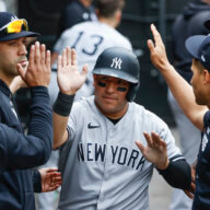 Yankees catcher Jose Trevino celebrates with teammates after scoring against the White Sox during the 2nd inning.