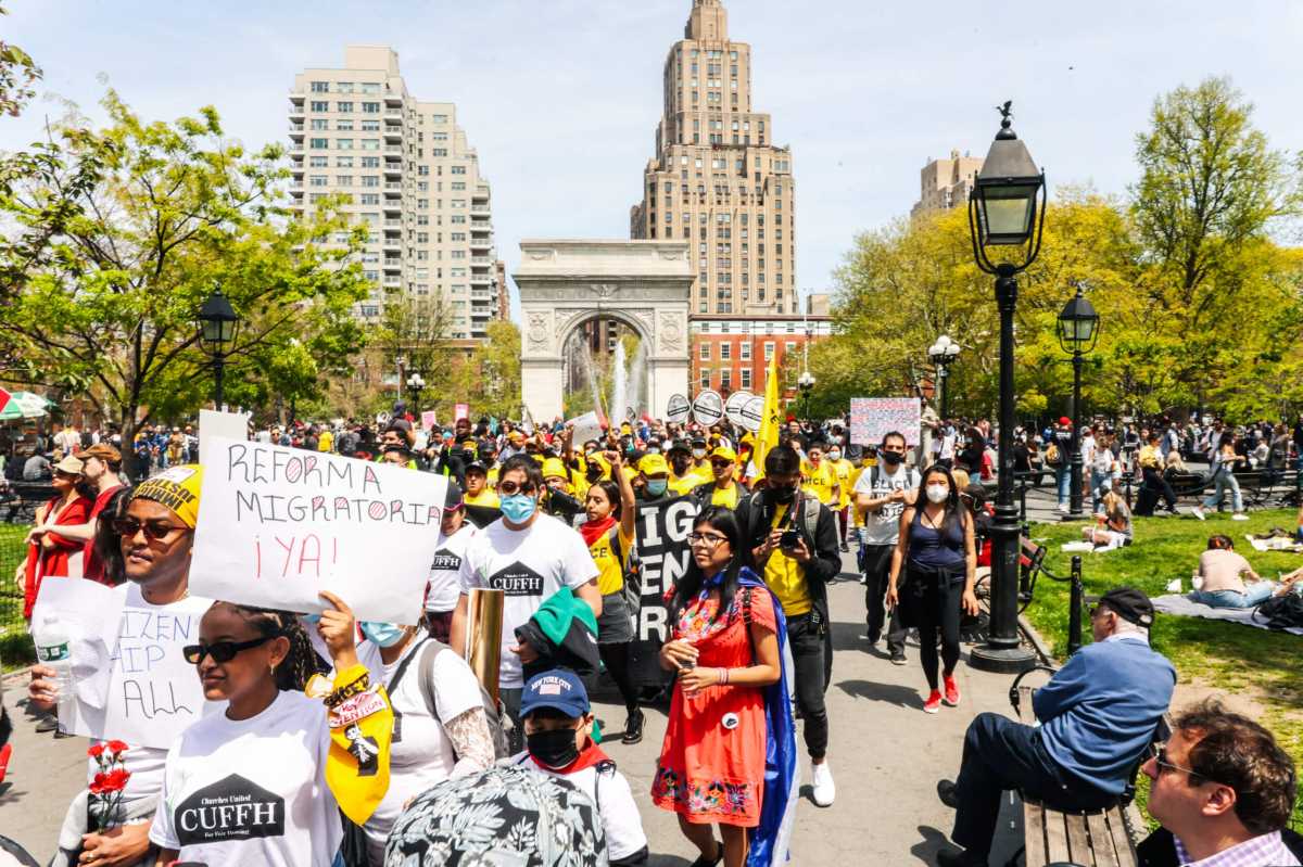 Hundreds marched from Washington Square Park for a May Day rally.
