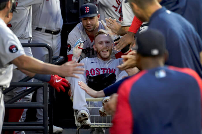 The Boston Red Sox celebrate a win in 2022 MLB action