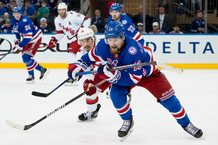 Filip Chytil. Rangers left wing Alexis Lafrenière and Carolina Hurricanes center Seth Jarvis chase the puck during the 2nd period of Game 6.