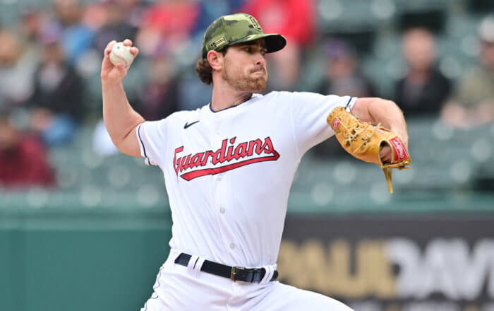 Shane Bieber delivers a pitch in 2022 MLB roster