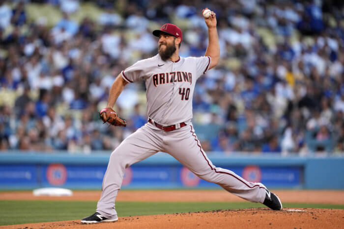 Madison Bumgarner delivers a pitch in 2022 MLB roster