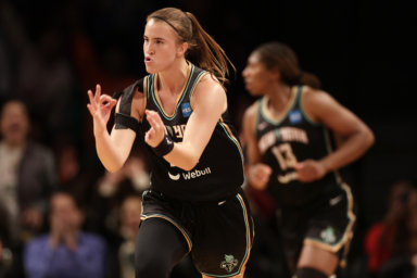 Liberty guard Sabrina Ionescu reacts after making a 3-point basket.