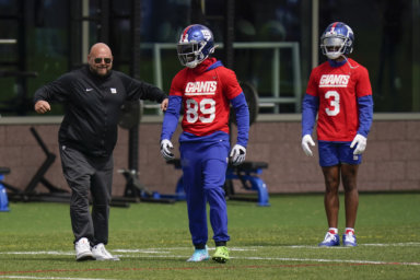 New York Giants head coach Brian Daboll, left, jokes with Kadarius Toney, center, and Sterling Shepard.
