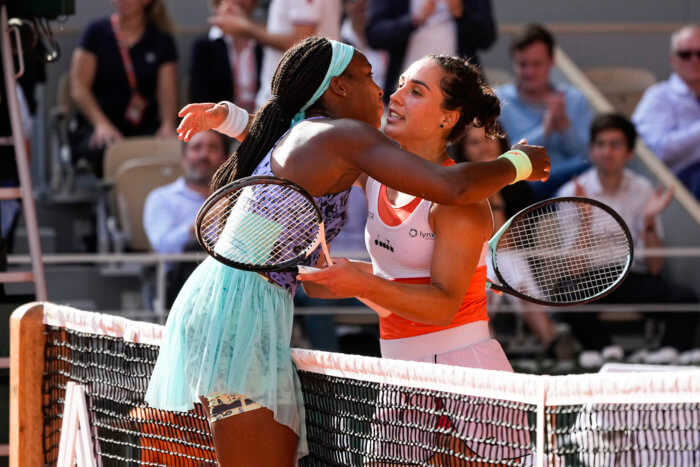 Coco Gauff embraces Martina Trevisan after their match