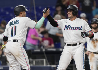 Marlins celebrate a home run in 2022 MLB action