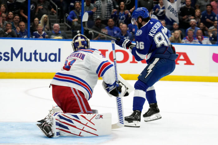 Tampa Bay Lightning right wing Nikita Kucherov (86) scores a goal against New York Rangers goaltender Igor Shesterkin, left, during the second period in Game 4.