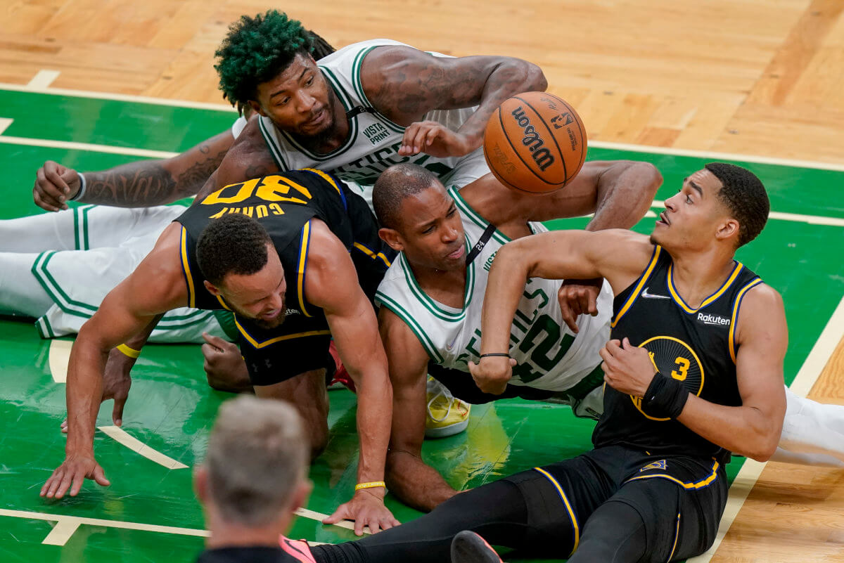A battle for a loose ball in the 2022 NBA Finals