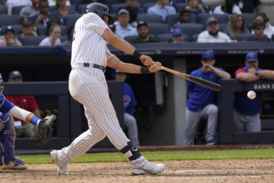 Yankees' Matt Carpenter hits an an RBI-double in the 7th inning of the Sunday game against the Chicago Cubs.