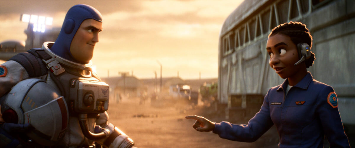 An image released by Disney/Pixar shows character Buzz Lightyear, voiced by Chris Evans, left, and Alisha Hawthorne, voiced by Uzo Aduba, in a scene from the animated film "Lightyear," releasing June 17, 2022.