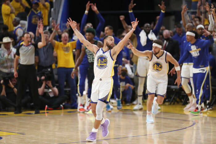 Stephen Curry celebrates a Warriors win
