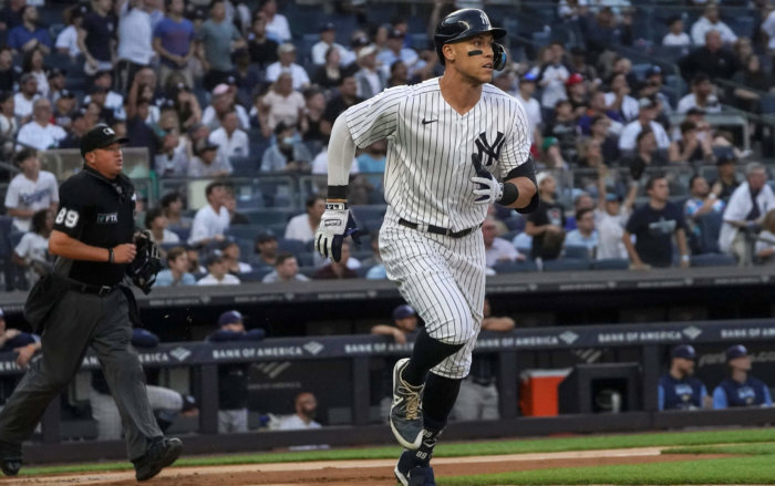 Yankees' Aaron Judge, who is heading to an arbitration hearing on Friday, watches a home run against the Rays on June 15.