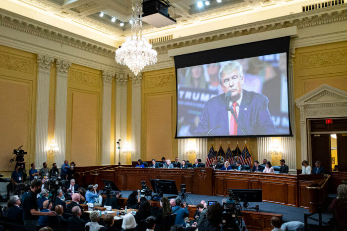 An image of former President Donald Trump is displayed as the House select committee investigating the Jan. 6 attack on the U.S. Capitol continues to reveal its findings of a year-long investigation.