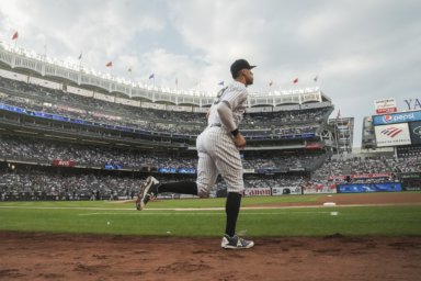 New York Yankees' Aaron Judge takes the field for the team's baseball game against the Houston Astros.