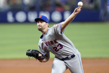 Mets starting pitcher David Peterson throws during the 2nd inning of their game against the Marlins on Sunday.