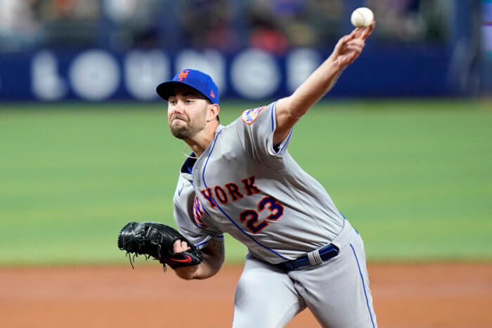 Mets starting pitcher David Peterson throws during the 2nd inning of their game against the Marlins on Sunday.
