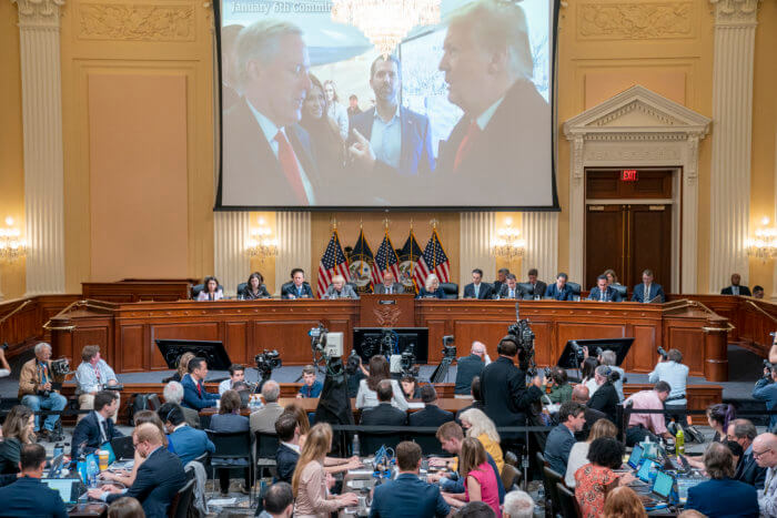A image of former President Donald Trump talking to his Chief of Staff Mark Meadows is seen as Cassidy Hutchinson, former aide to Trump White House chief of staff Mark Meadows, testifies as the House select committee investigating the Jan. 6 attack on the U.S. Capitol.