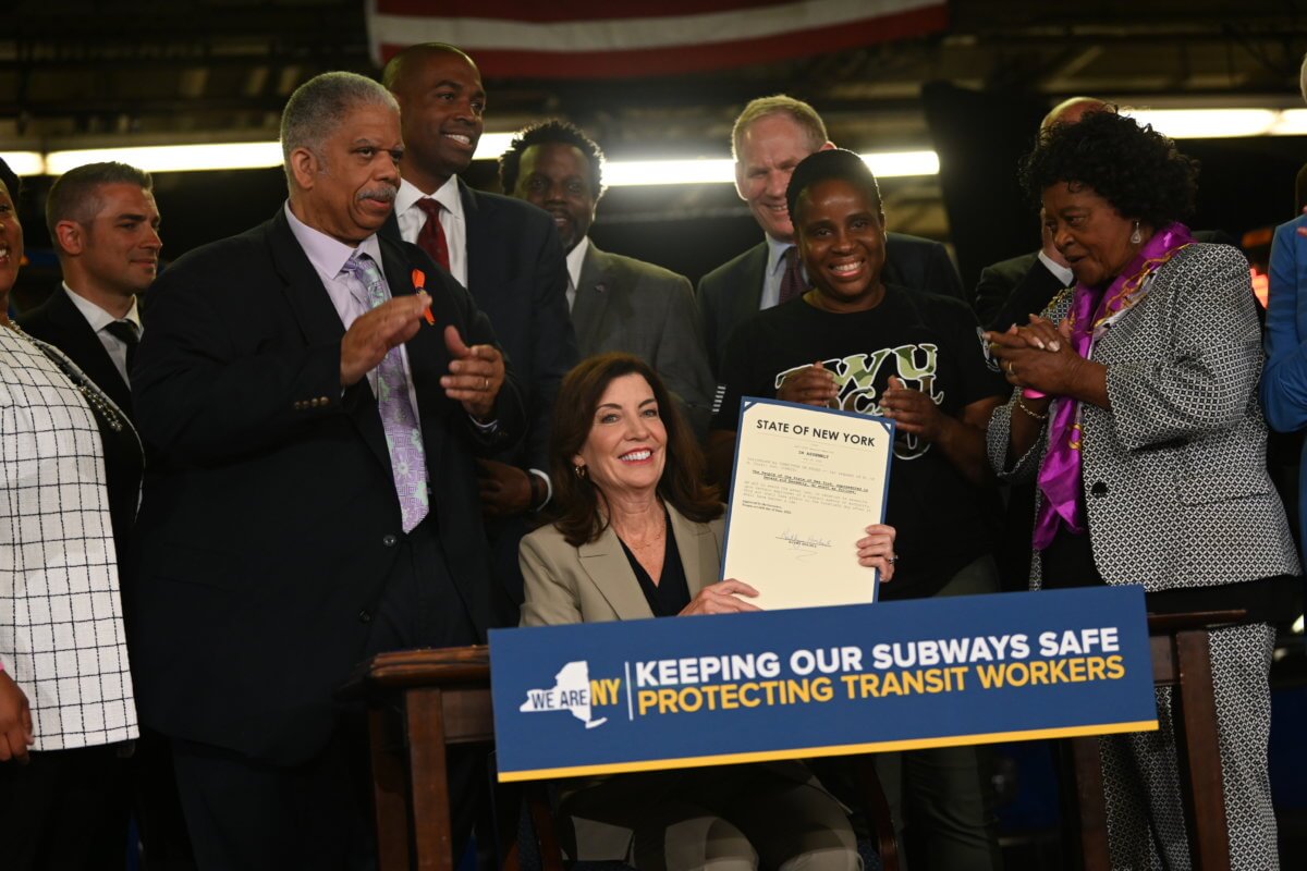 Gov. Kathy Hochul signed a bill Monday expanding protections against assault to over 11,000 MTA transit workers.